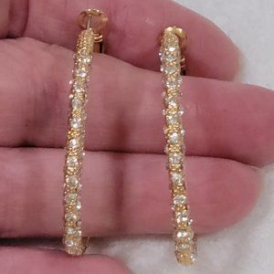 Gold toned hoop pierce earrings with rhinestones